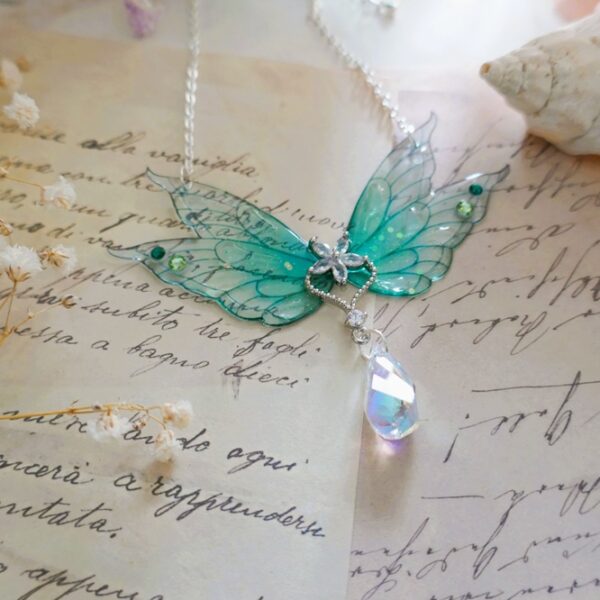 Collier argent résine transparente flexible ailes de fée turquoise paillette et cristaux